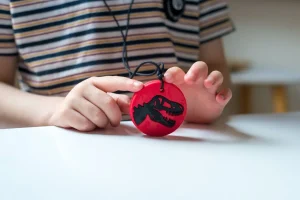 Jellystone Dino Pendant - Grey